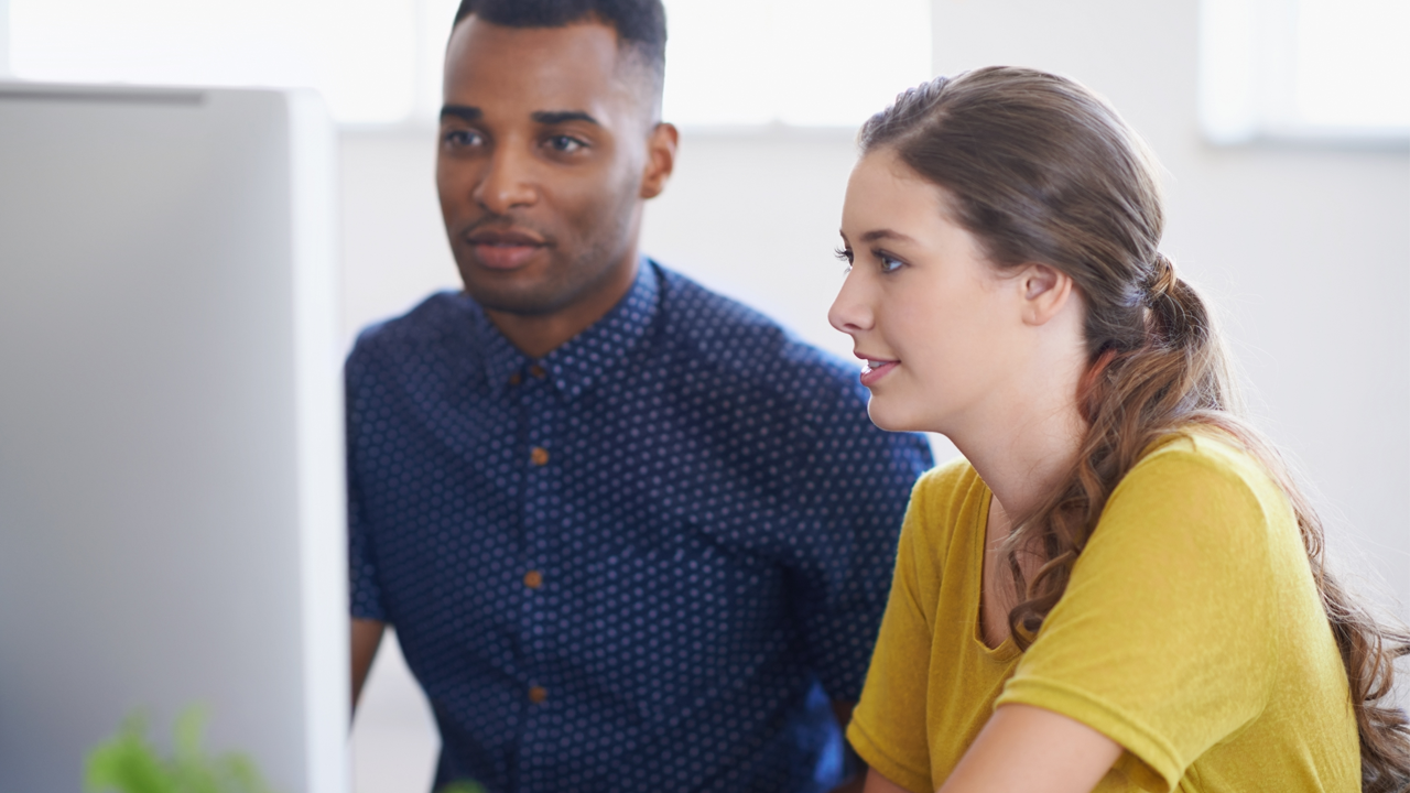 Student working on planning her future with a mentor helping her