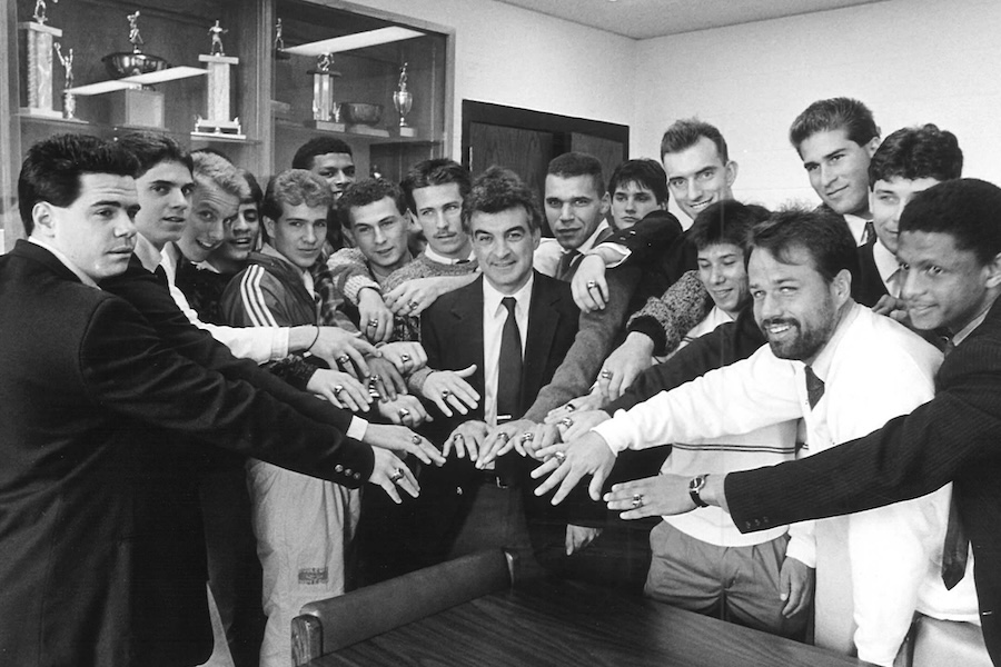 Bob Dikranian and his team showing their championship rings