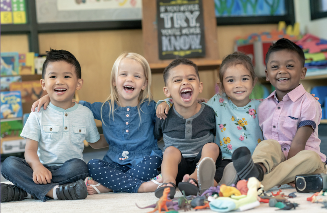 A group of little children in a classroom setting