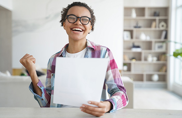 Young adult with a acceptance letter from Southern CT University