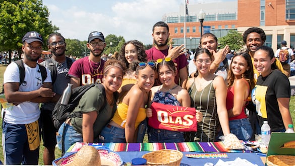 Students representing a club at their club table