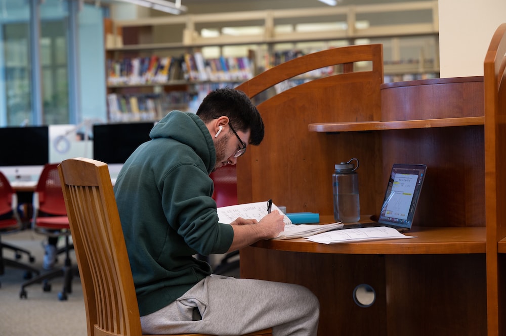 a student studying inside a library