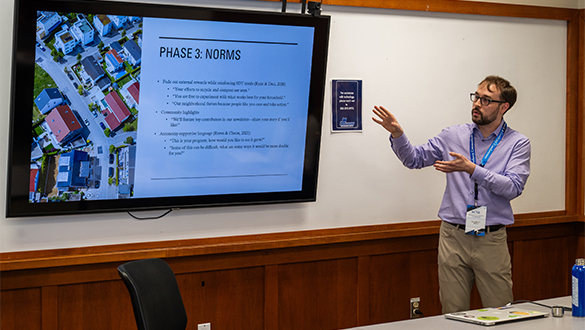 A graduate student participating in Three Minute Thesis® Competition