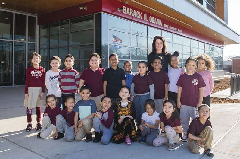 Teacher and schoolchildren at the Barack H. Obama School
