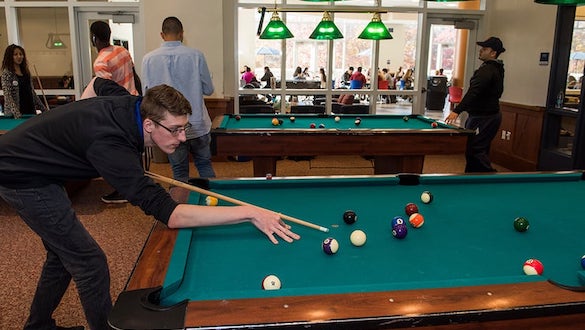 Person playing pool