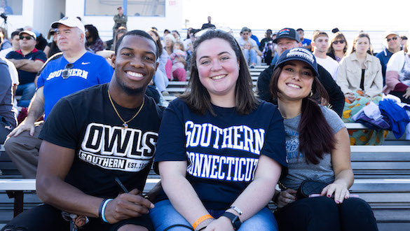 Three students sitting