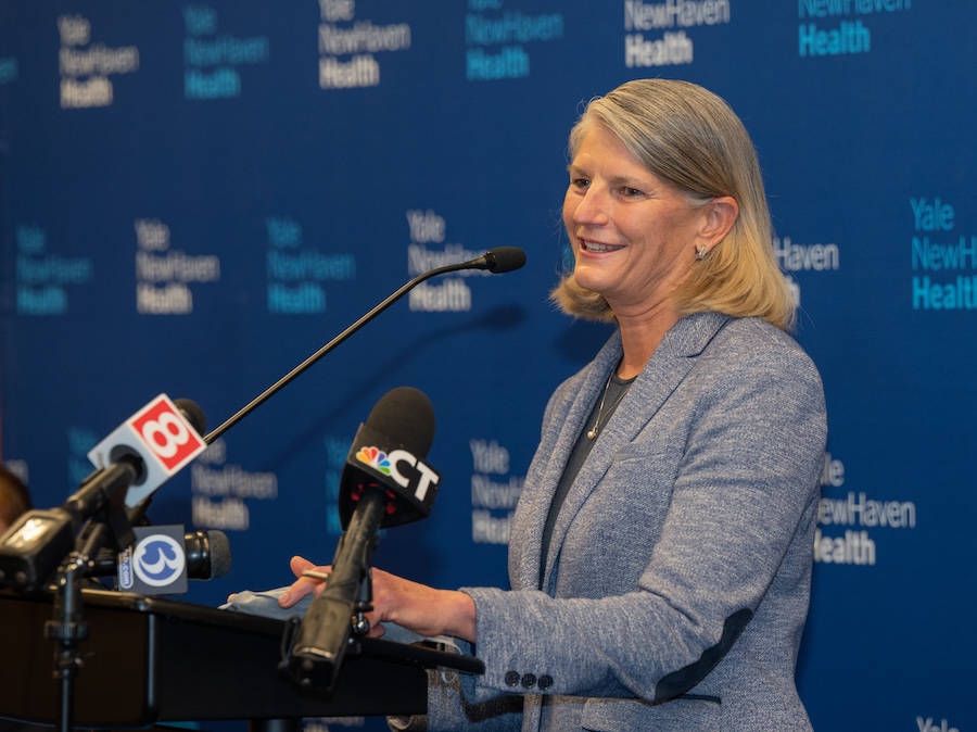 Dr. Sandra Bulmer speaking with the press