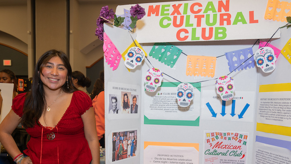 Student with her presentation titled Mexican Cultural Club