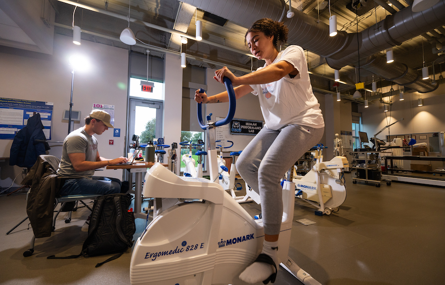 Student on exercise bike