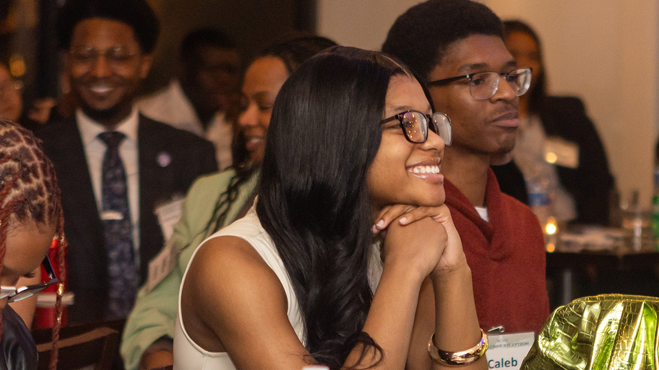 Student Smiling During Ceremony