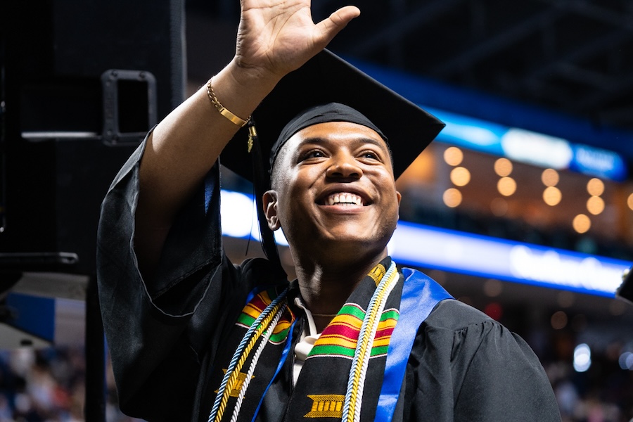 Graduate at commencement