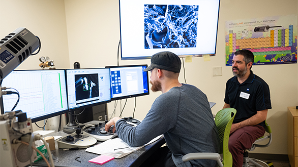 Graduate student working on a quantum machine