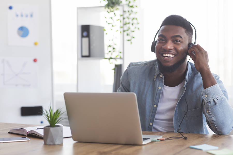 Smiling person in headphones