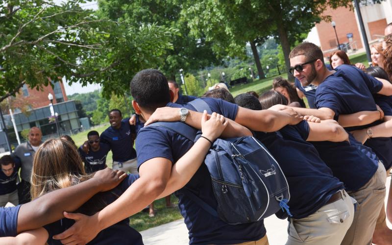 Students in a huddle