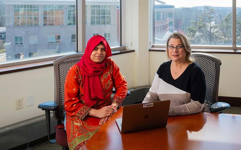 Amy Feest, senior director of the Office of Workforce and Lifelong Learning (right), and OWLL Graduate Assistant Sharaban Tohura (left)
