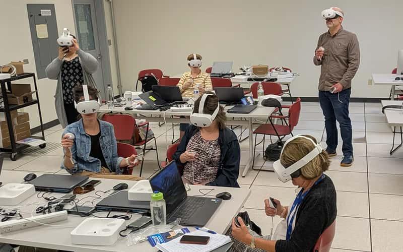 students wear virtual reality goggles in a course that is part of Southern's OWLL