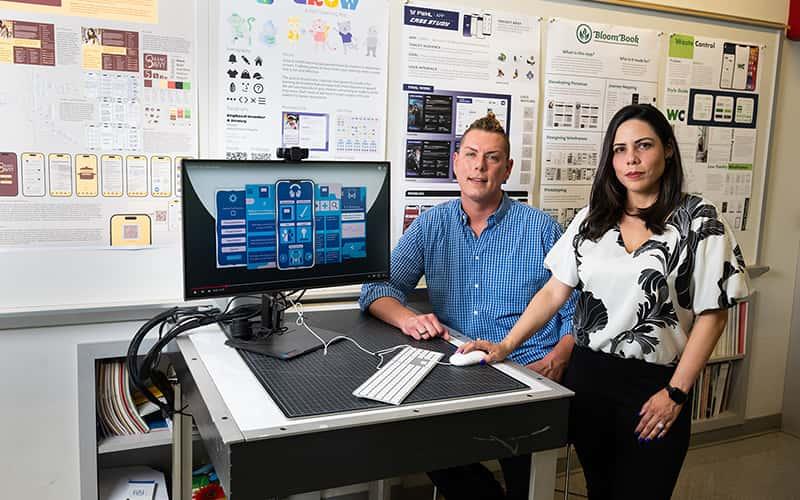 graphic design professors Alex Girard and Melanie Uribe