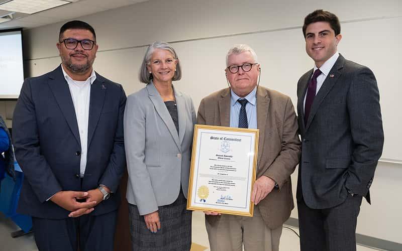State Rep. Christopher Rosario, SCSU Interim President Dr. Sandra Bulmer, CSU Professor David Pettigrew, and State Rep. Matt Blumenthal gather at Southern Connecticut State University for the inaugural observance of Varian Fry Day on Oct. 15, 2025 — honoring the American journalist who rescued thousands from Nazi-occupied France during World War II.