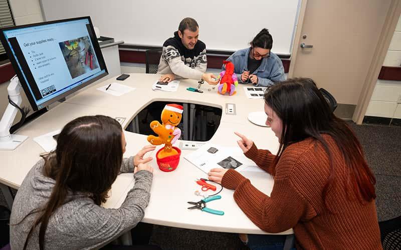 Graduate students in Southern’s assistive technology certificate program rewire battery-operated toys to make them switch accessible, creating more inclusive play opportunities for children with physical disabilities.