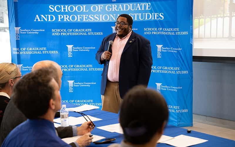 Keith Smith, winner of Southern's 3-Minute Thesis competition at the doctoral level, speaks to an audience