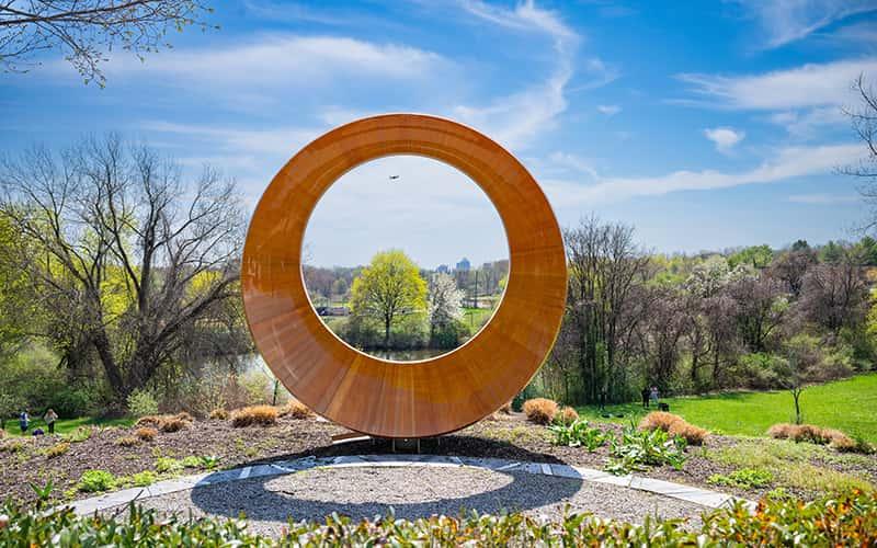 The restored Sandy Hook memorial returns to its home overlooking campus, once again serving as a space for reflection and remembrance.