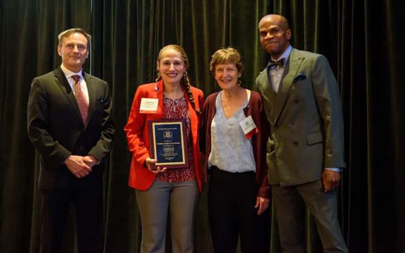 Dr. Christine Caragianis Broadbridge (second from left) accepts the Distinguished Service Award from the Connecticut Academy of Science and Engineering (CASE).