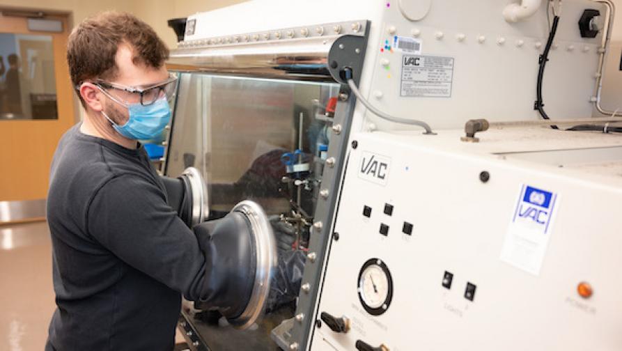 Student using mechanical equipment