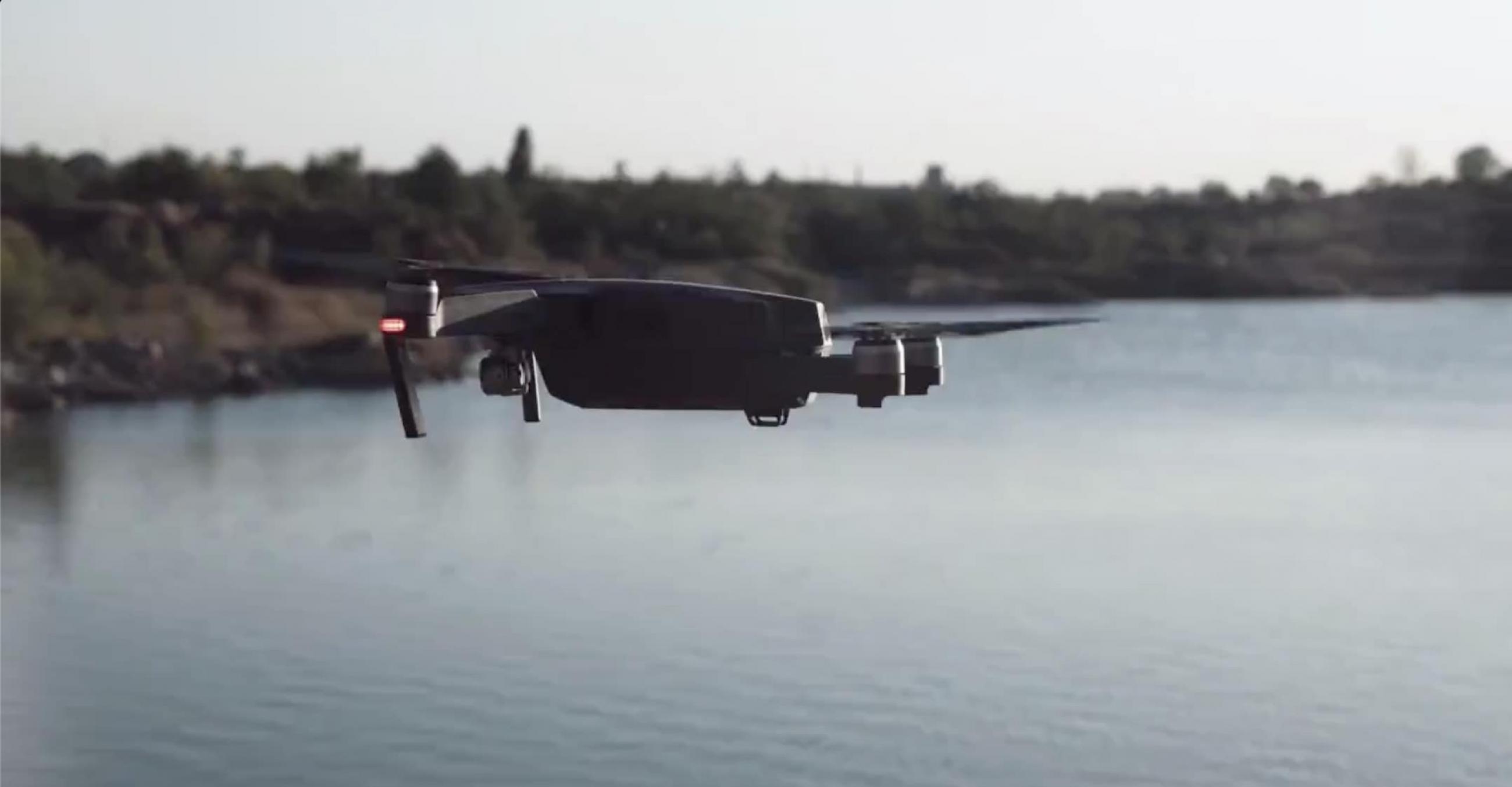 "Drone flying over a lake"