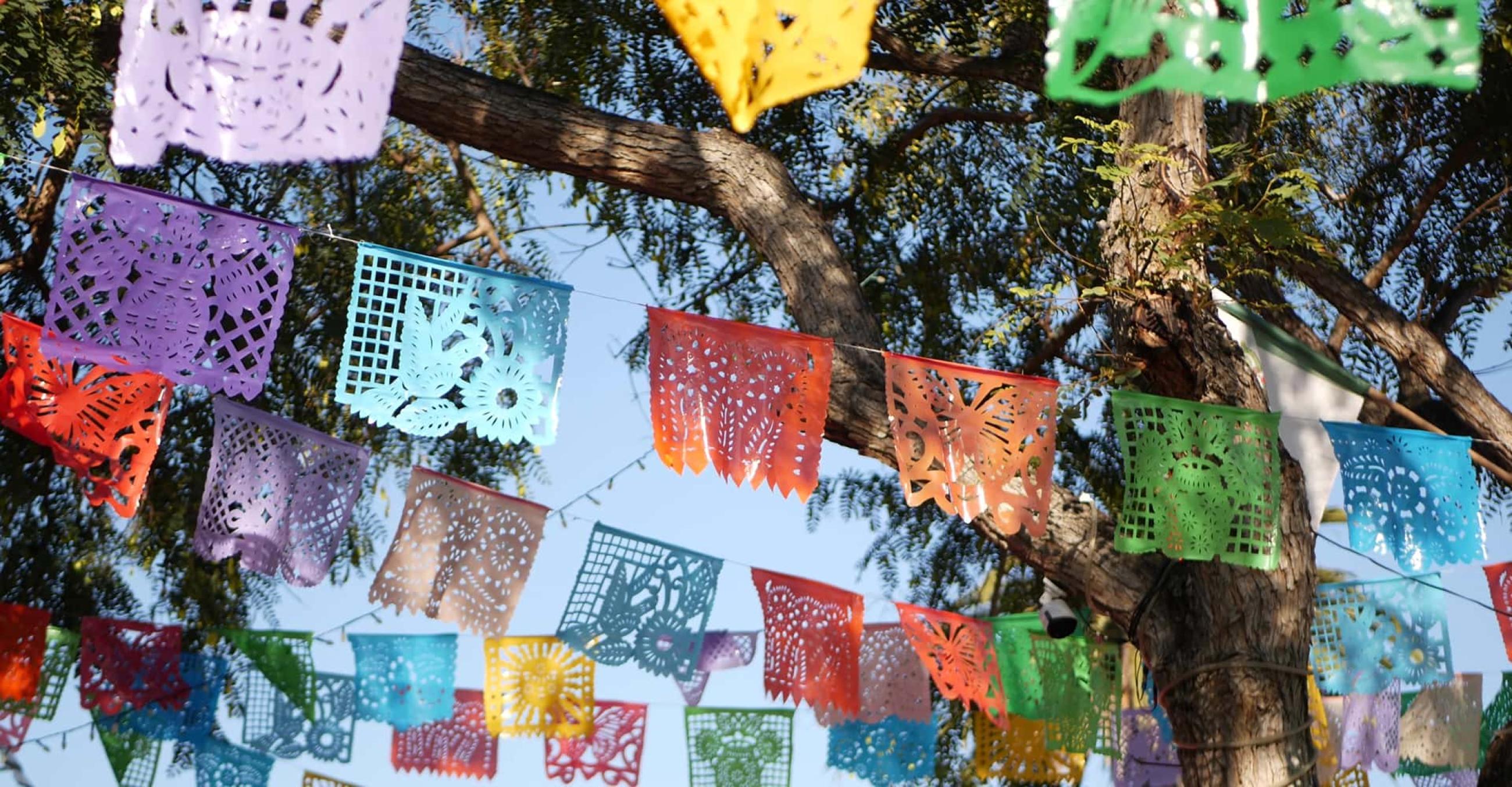 A colorful mexican perforated papel picado banner