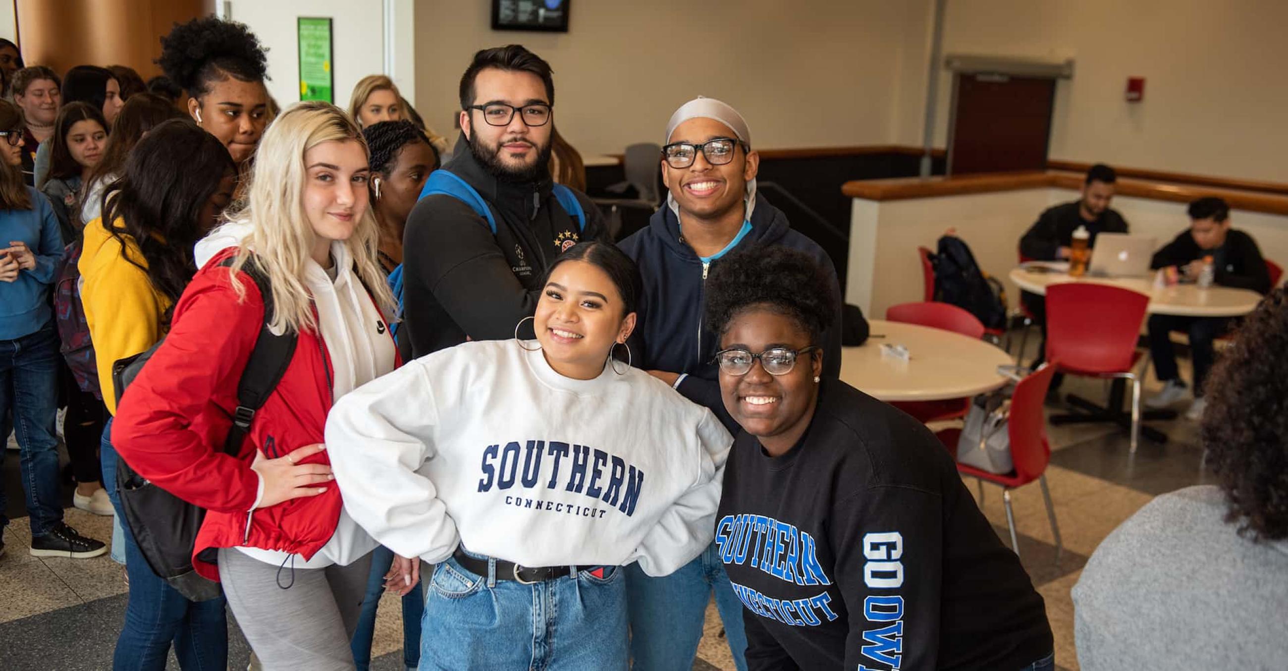 a group of students wearing SCSU sweatshirts 