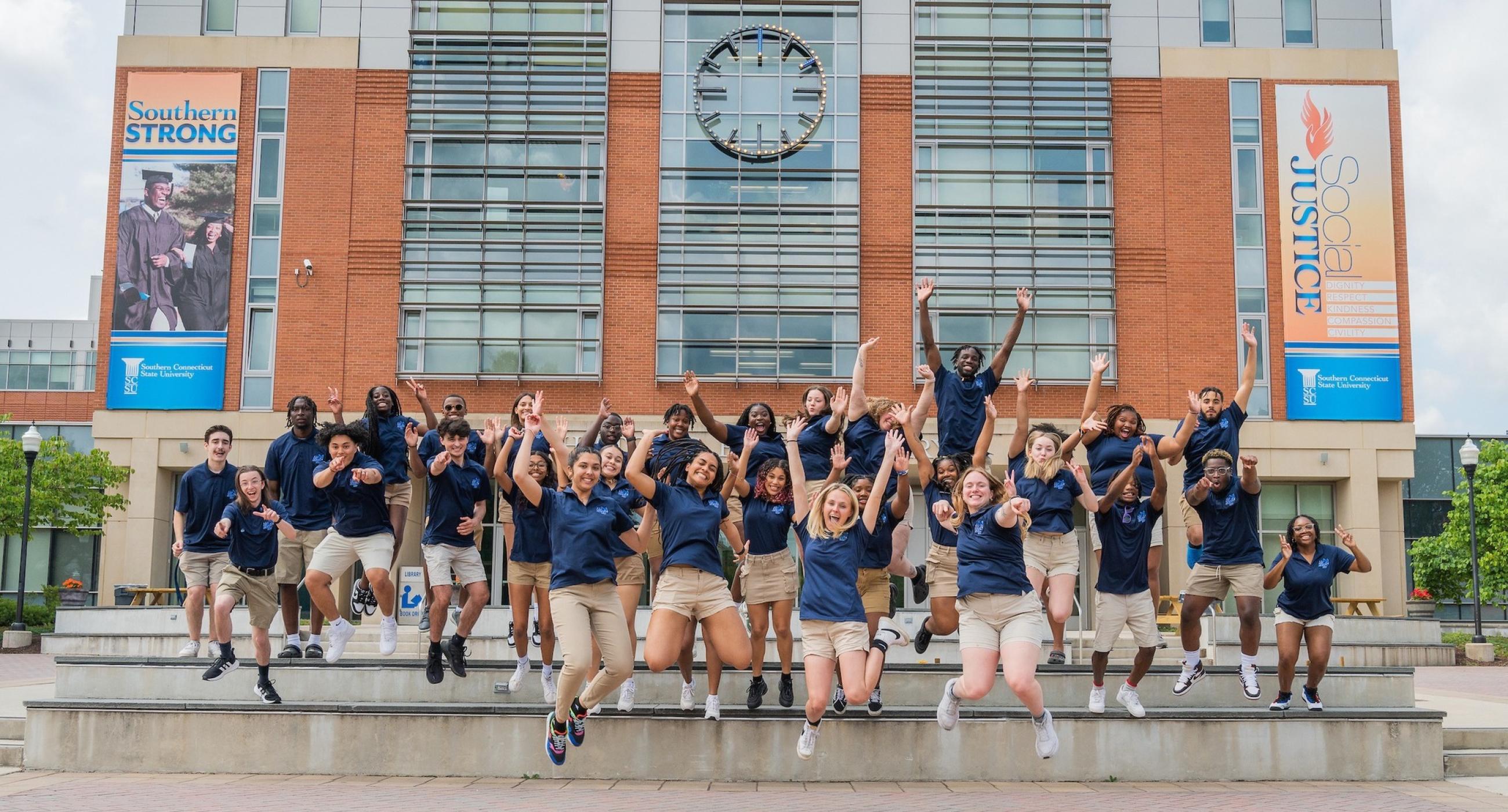 Orientation ambassadors in front of Buley library