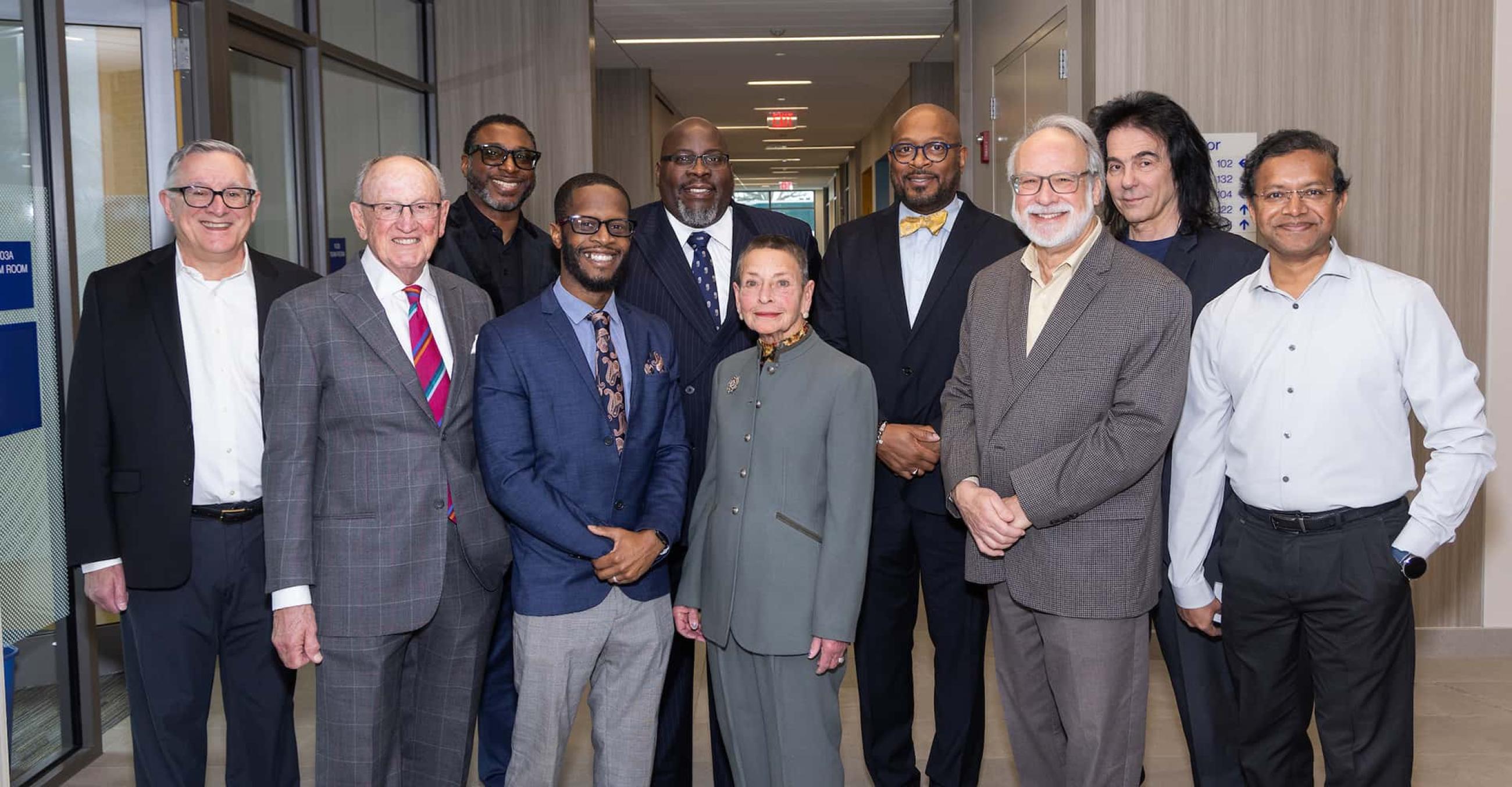 a group of campus administrators and representatives from the Community Foundation for Greater New Haven