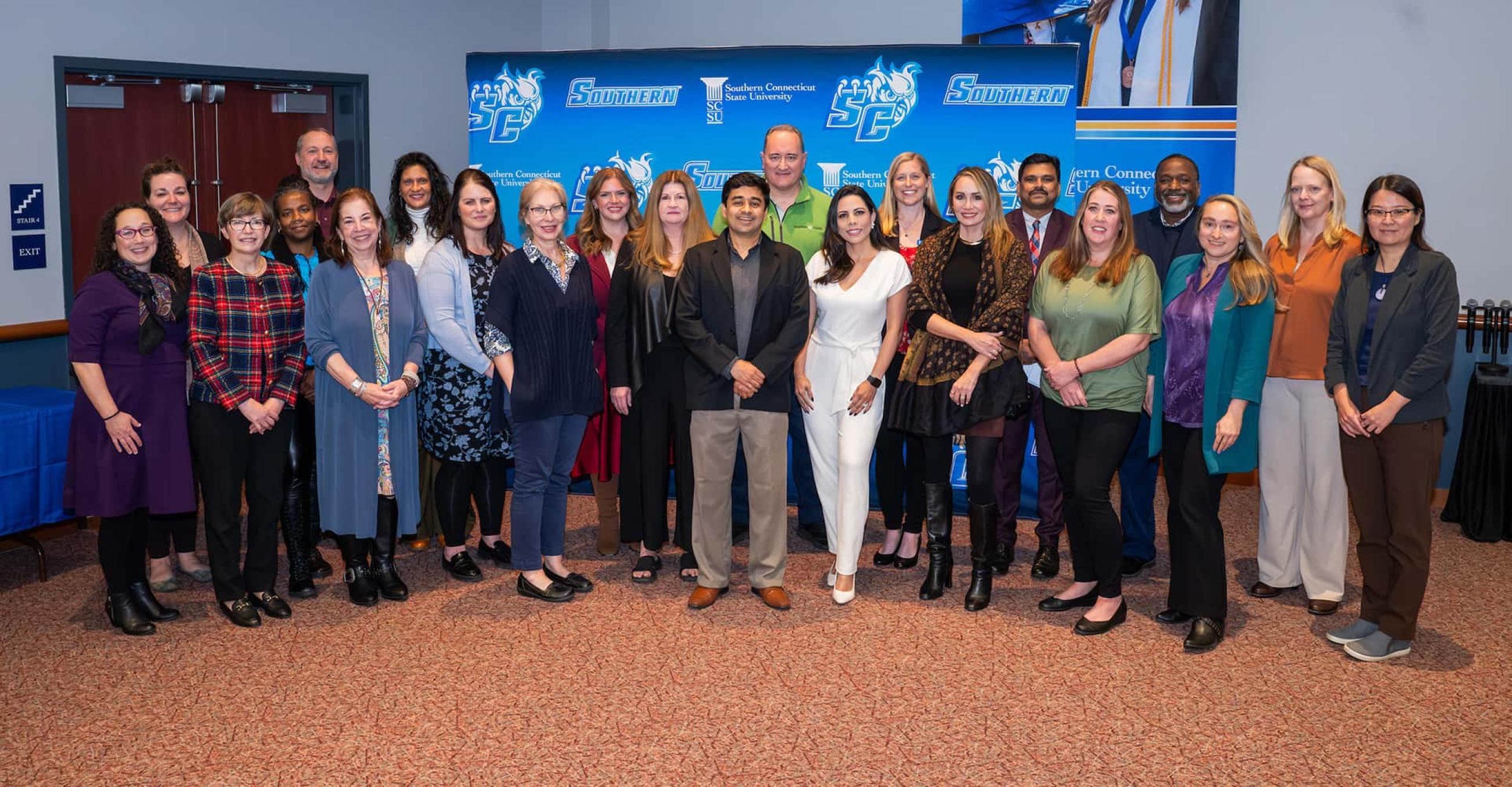 a group of faculty who were honored at the recent Promotion & Tenure event
