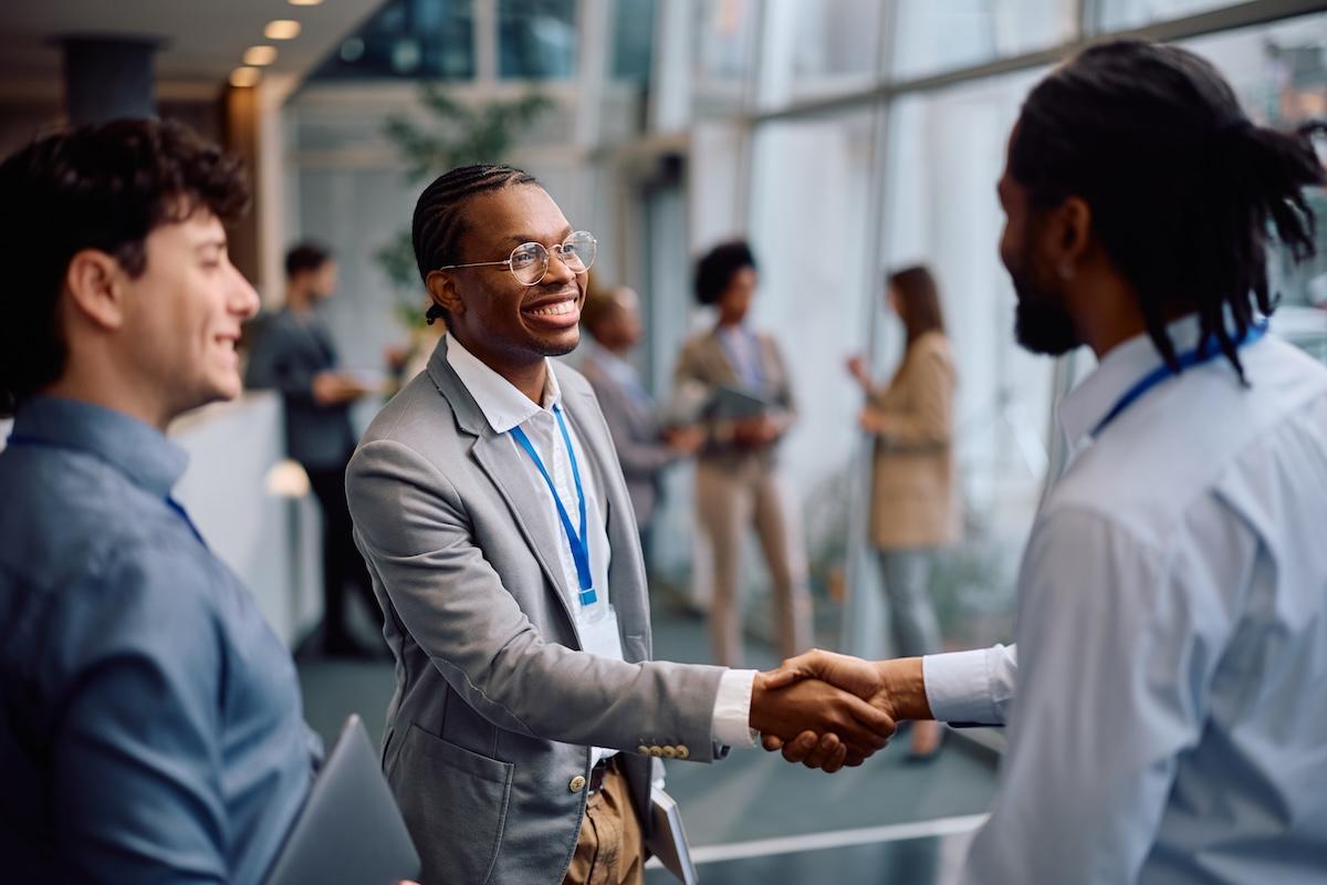 Business professionals shaking hands