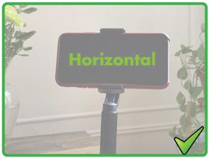 Phone in a horizontal position with a green checkmark